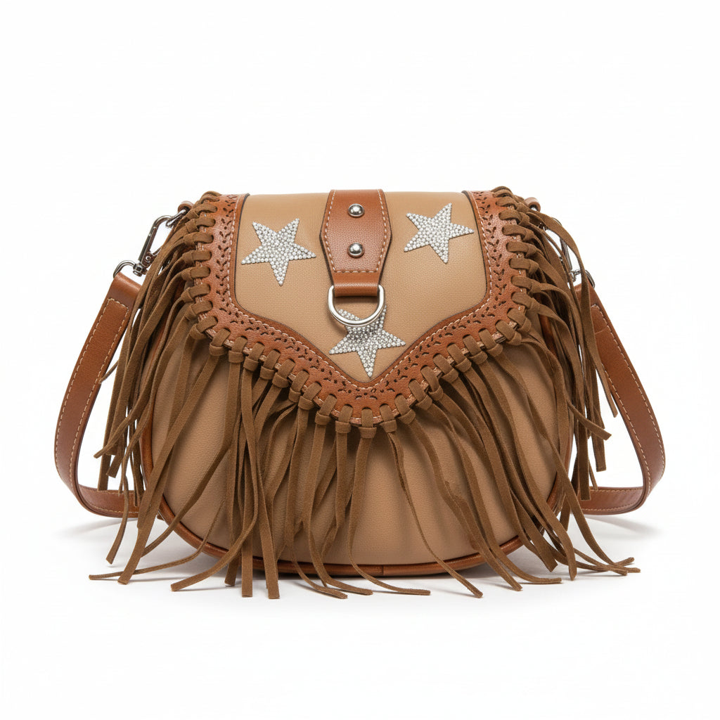Brown leather handbag with star designs and fringe on a newspaper background