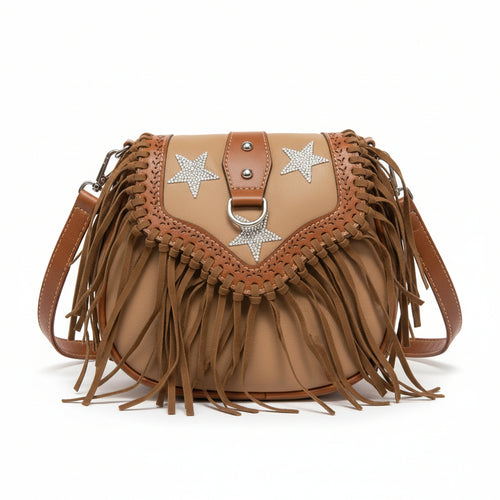 Brown leather handbag with star designs and fringe on a newspaper background