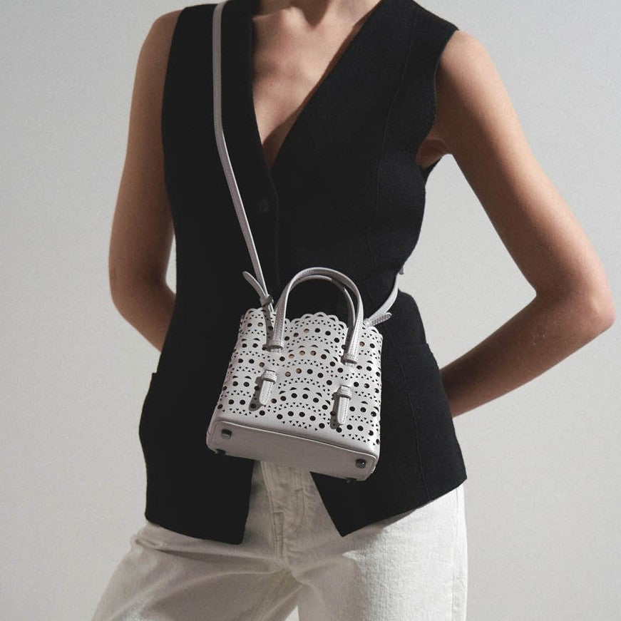 Atelier Sacrum Elegant Hollow Carved Vegan Leather Tote and Shoulder Messenger Bag