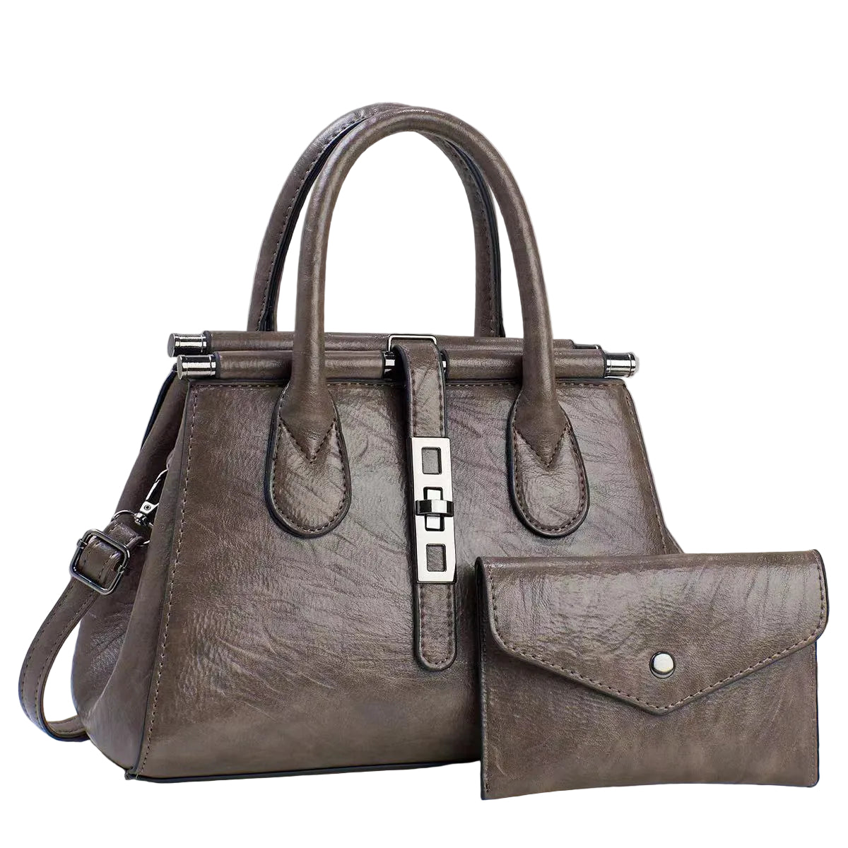 Brown leather handbag with matching wallet on a light gray background