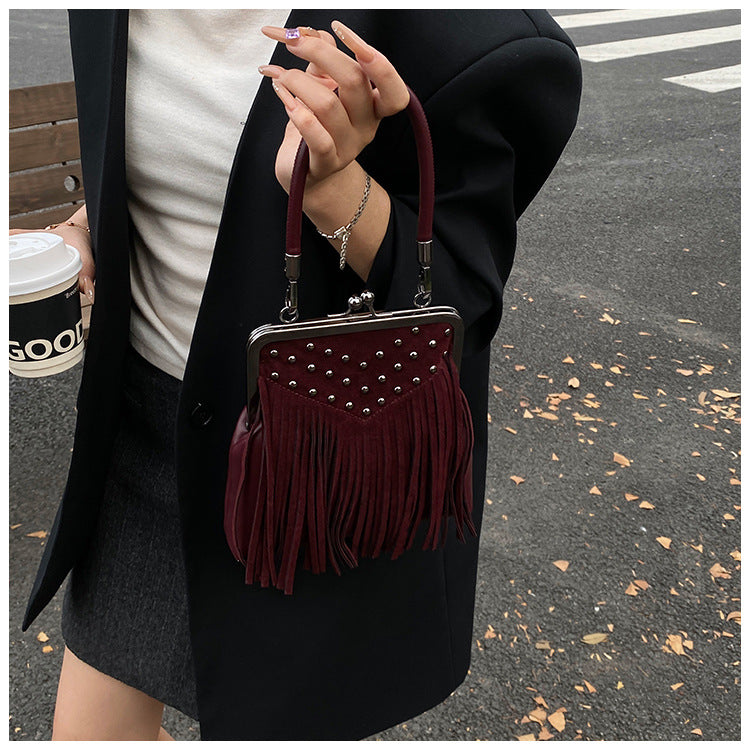 Retro Rivet Tassel Shoulder Messenger Bag in Vegan PU Leather