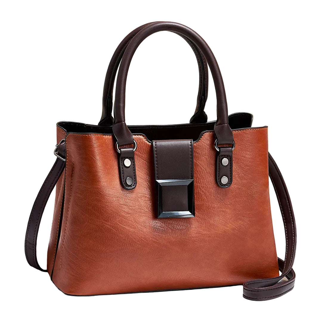 Brown handbag with black accents on a light background