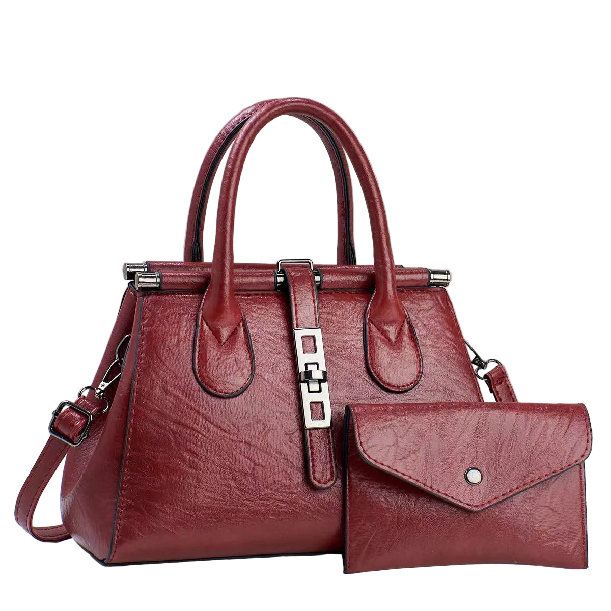 Red handbag with matching wallet on a light gray background