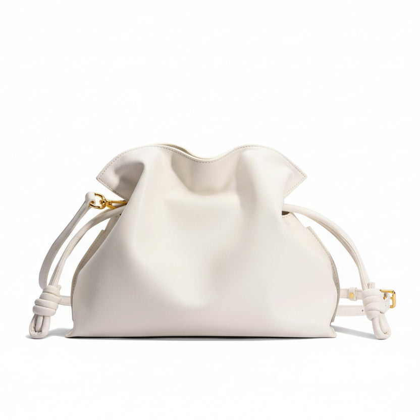 White drawstring bag on a light gray background