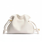 White drawstring bag on a light gray background