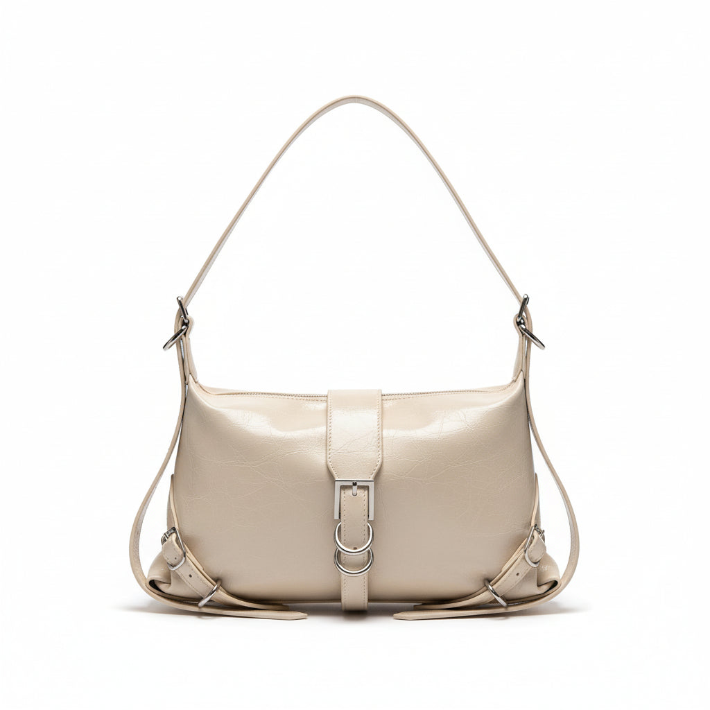 Beige handbag on a surface with a minimalistic background