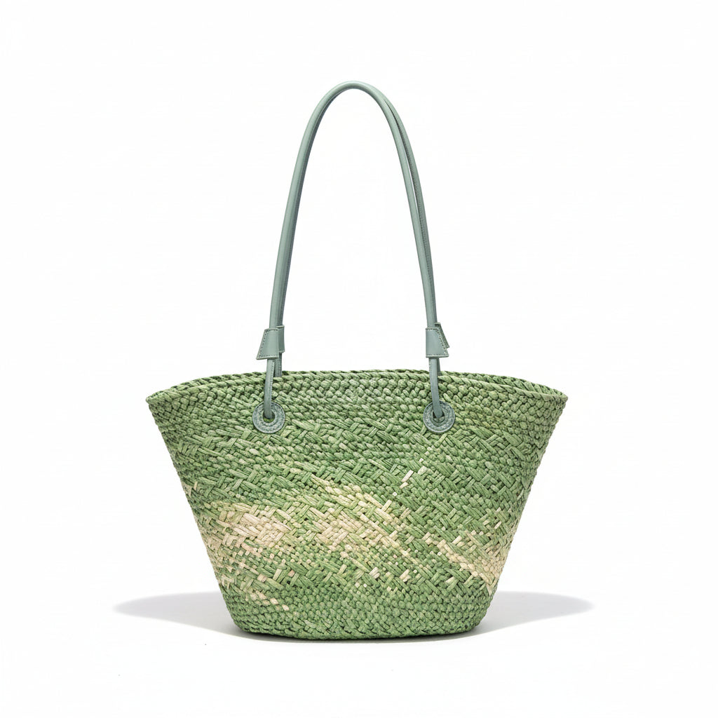 Green woven handbag on a hanger against a white background