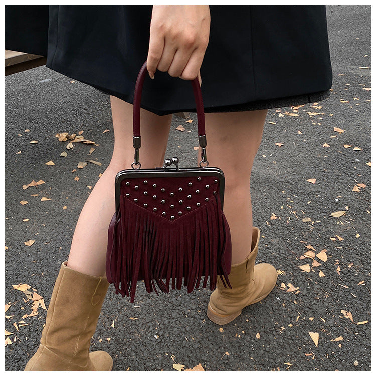 Retro Rivet Tassel Shoulder Messenger Bag in Vegan PU Leather